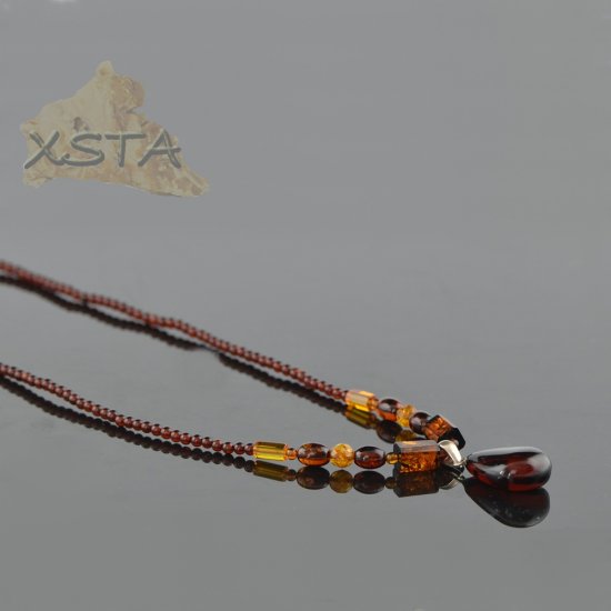 Amber necklace with cherry pendant